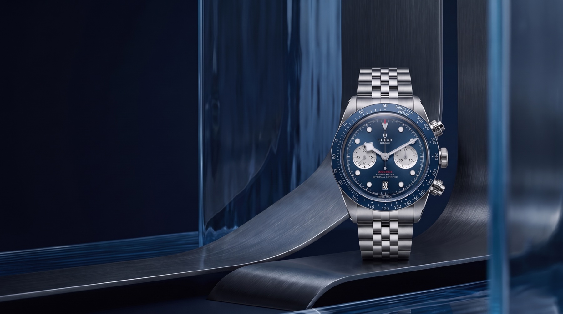 TUDOR Black Bay Chrono Blue in a sculpted scene of sapphire light and dark steel